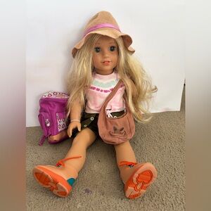 American Girl Doll with Blonde Hair and Pink Outfit